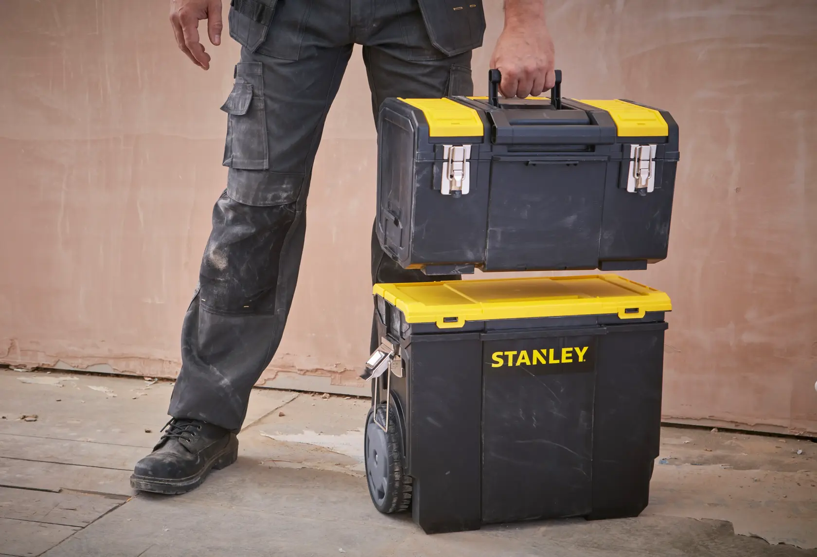 Stanley 1-70-326 black and yellow rolling toolbox set, photographed in workshop setting.