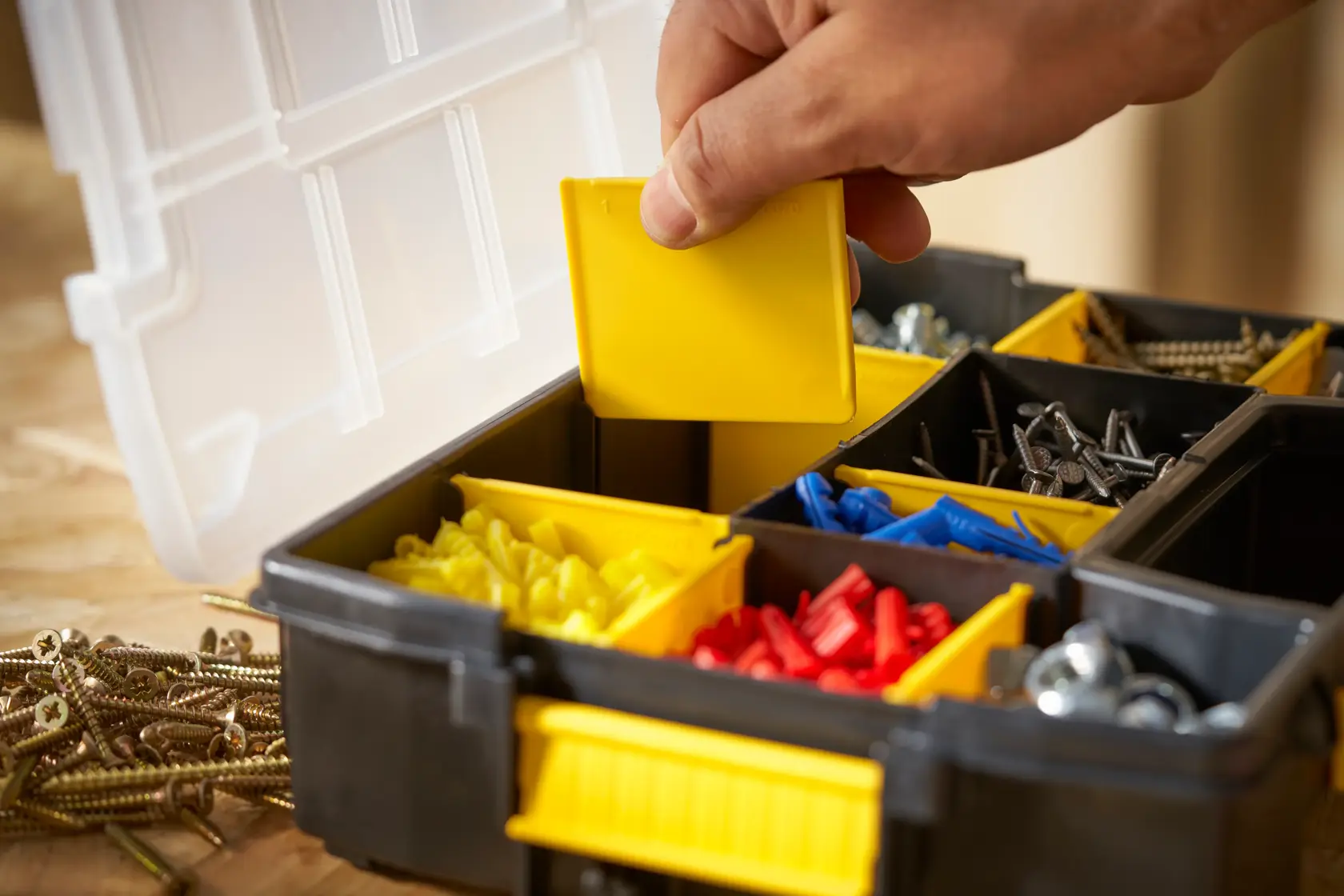 STANLEY STST1-70720 organizer box closeup with compartments for screws, bolts, and colored anchors.